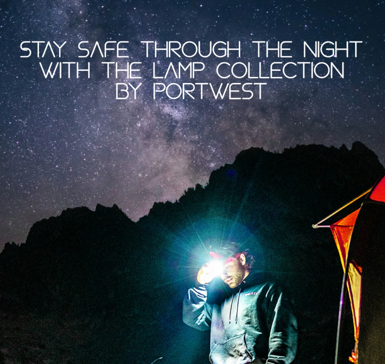 Image of a man standing in front of a dark mountain ridge. The man is next to a tent and wearing a headlamp. In the background, the starry night sky is visible. At the top of the image appears the title: safe through the night with the Portwest lamp collection.