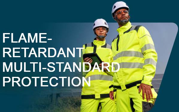 Image of two workers in yellow high-visibility clothing with white hard hats. A photovoltaic system can be seen in the background. "Flame-resistant multi-standard protection" is the headline printed in white block letters above the image.