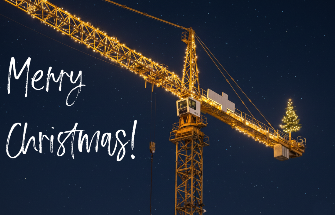 Night-time scene of an illuminated crane. At the rear end of the crane there is a Christmas tree with warm yellow lighting, and on the left side of the image the words &lsquo;Merry Christmas&rsquo; appear in elegant white script.