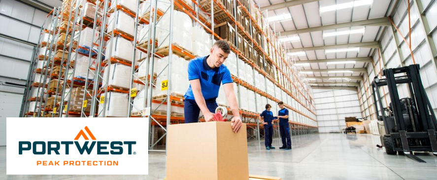 A warehouse worker in blue workwear is sealing a large box with tape in a modern, bright high-bay warehouse. Two other employees can be seen chatting in the background. The Portwest logo with the slogan "Peak Protection" is displayed at the bottom left of the image.