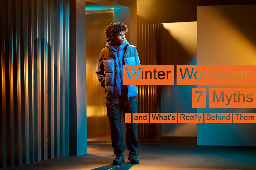 A worker in blue and black workwear standing in a room with multiple passages. The walls are striped and there is a play of light and shadow. On the right side of the image is the heading: Winter Workwear: 7 Myths &ndash; and What&rsquo;s Really Behind Them